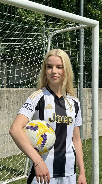 Cute Juventus Girl on the Green Field