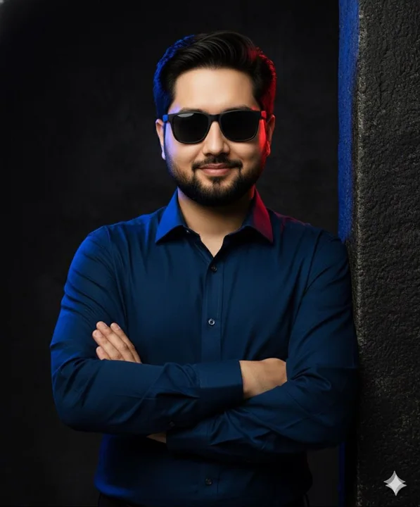 Confident young man portrait under red and blue contour lighting