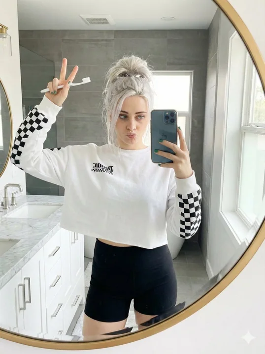 Blond Bombshell Playful Morning Bathroom Selfie