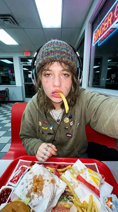Exaggerated wide-angle fries self-portrait at 3 a.m.